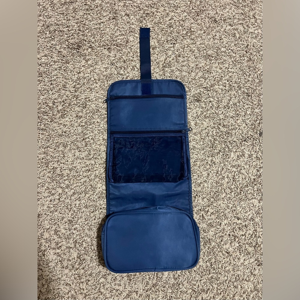 Clarins Men's Blue Travel Bag